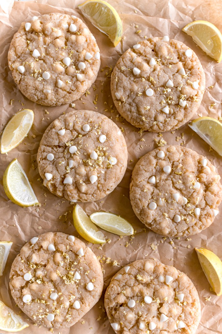 lemon and white chocolate cookies on a parchment paper