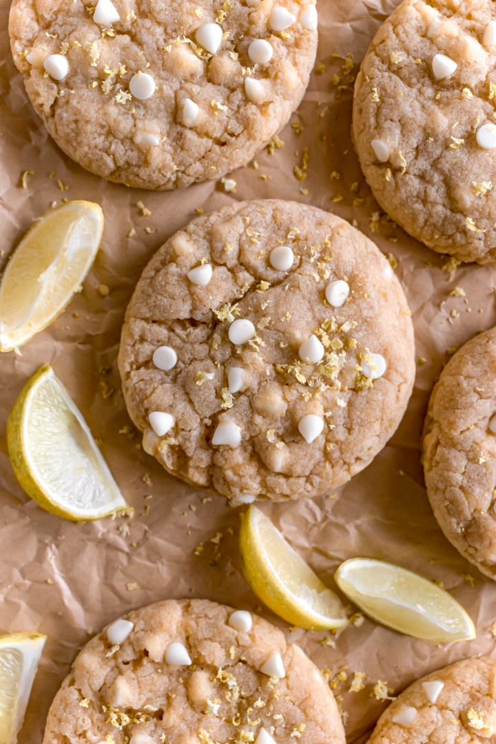 lemon and white chocolate cookies on a parchment paper