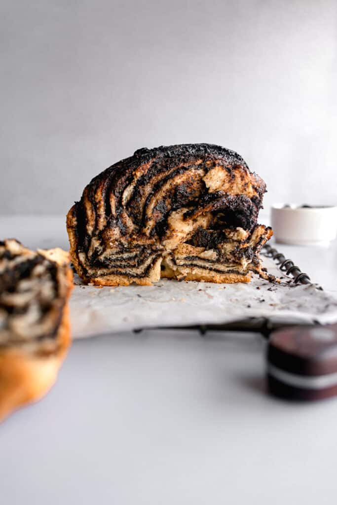 Sliced chocolate espresso babka on a wire rack
